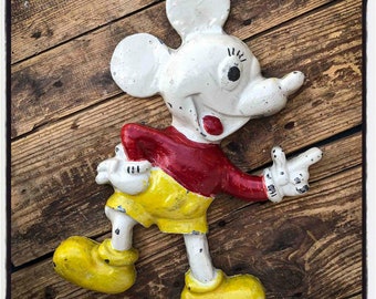 Old vintage mickey mouse figure in iron.
