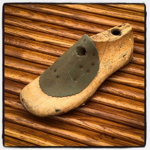 Vintage children&#39;s wooden shoe lasts, old shoe mold