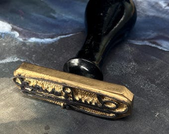 Old brass and black wood handle signature ink stamp with vintage charm