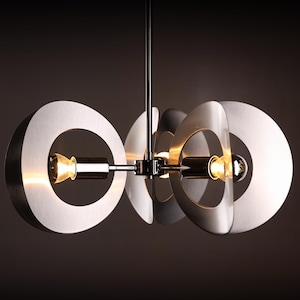 A vintage stainless steel and chromed Space Age chandelier / pendant lamp from France MCM lighting design 1970’s