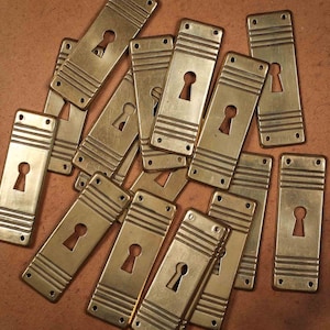 Vintage reclaimed antique keyholes, salvage from from old -ruined furniture, brass cabinet hardware