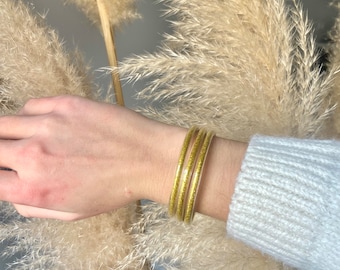Bracelet doré bouddhiste, jonc bouddhiste, bracelet porte bonheur, flexible et imperméable, jonc doré, joncs, bracelet