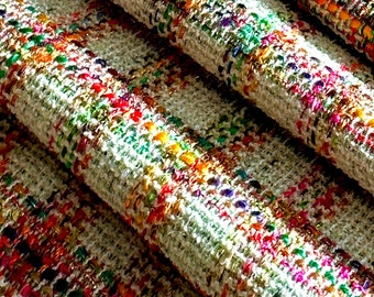 Premium Italian tweed fabric, wool blend, lurex thread, bright checkered colors, main tone beige with hints of pastel green, loose weave.