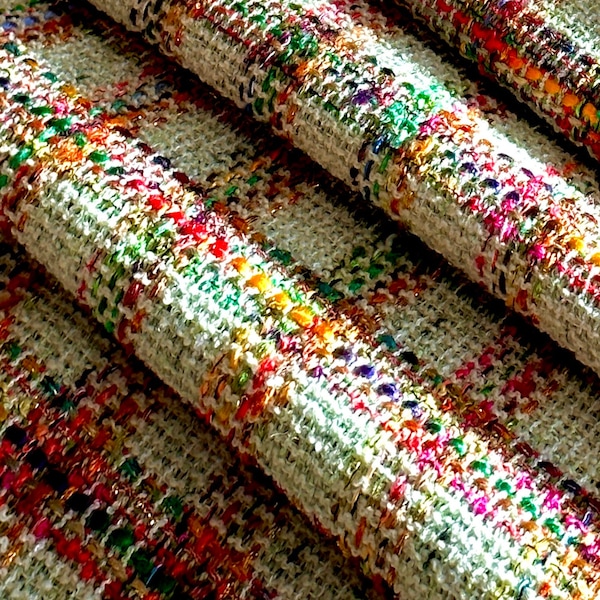 Premium Italian tweed fabric, wool blend, lurex thread, bright checkered colors, main tone beige with hints of pastel green, loose weave.