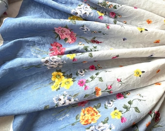 High-quality cotton viscose fabric, made in Italy, for girls, panel fabric panel height 45 cm, floral print, blue and white background.
