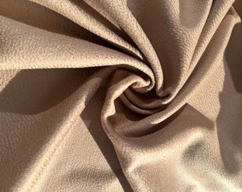 High-quality Italian 100% cashmere fabric from a renowned designer in camel colors. Top quality, luxury fabric.