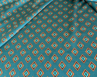 Hoogwaardige Italiaanse viscose-satijnstof in turquoise kleur, prachtige print, goede kwaliteit, designerprint!