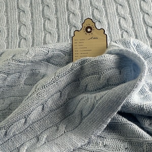Italian knit fabric, cable knit made of soft virgin wool in delicate sky blue