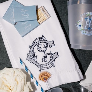 May include: A rustic wooden sign with the text "Welcome to our home" in white lettering. The sign has a distressed finish and a simple, inviting design, suitable for a front porch or entryway.