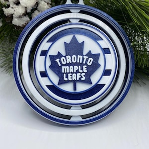 Toronto Maple Leafs Spinning Christmas Ornament – NHL Holiday Décor for Tree & Fan Cave – Perfect Gift for Hockey Fans