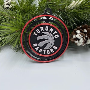 Toronto Raptors Spinning Christmas Ornament – NBA Holiday Décor for Tree & Fan Cave – Perfect Gift for Basketball Fans