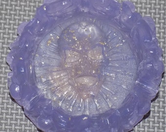 Epoxy resin demon skull ashtray, glows in the dark.