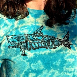 Jinx Fishbones T-Shirt & Hoodie | Block printed gamer merch, gamer gifts, shark rocket launcher, Arcane League of Legends, Unisex Clothing