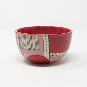 1 Hand-Crafted, Stoneware Bowl with a Variety of Monochromatic  Red Repeating Patterns and Stripes
