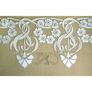 May include: A decorative wall panel featuring a repeating floral pattern in white against a tan background. The design includes stylized flowers and intertwined lines, creating a textured, embossed effect. The overall aesthetic is reminiscent of Art Nouveau.