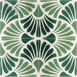 Puede incluir: Un azulejo cuadrado con un patrón geométrico de verde y blanco. El patrón está formado por formas de abanico superpuestas.