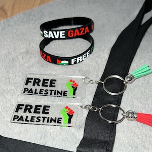 Free Gaza/Save Palestine wristbands| Silicone| Bracelets| Childrens| Adults| Unisex| Arabic| Handmade clay beads bracelet |