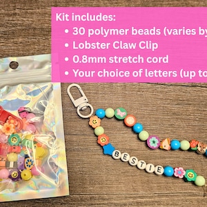 May include: A DIY kit containing polymer beads, a lobster claw clip, and stretch cord. The kit offers personalization with up to 15 letters. A beaded keychain spells "BESTIE" with various decorative beads. The kit includes 30 polymer beads.