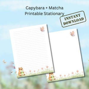 May include: Two sheets of printable stationery with a capybara holding a matcha drink, butterflies, and floral accents. One sheet is lined, the other blank. The text "Capybara + Matcha Printable Stationery" and "Instant Download" are visible.