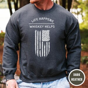 Life Happens Whiskey Helps Sweatshirt Funny Whiskey Drinker Gift for Men Fall Whiskey Crewneck Pullover Distressed Whiskey Quote Shirt