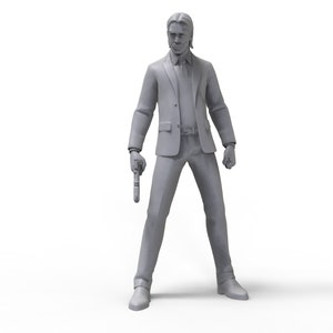May include: A gray figurine of a man wearing a suit and holding a gun. The figurine is standing with one leg slightly forward and the other leg straight.
