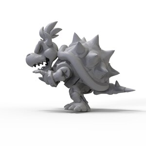 May include: A grey, 3D printed model of a Koopa Troopa, a character from the Super Mario video game series. The model is posed in a running position with its head turned to the side.