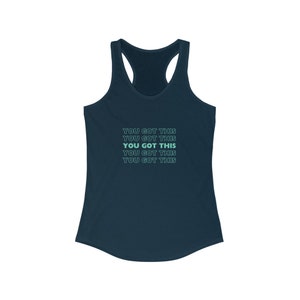 May include: A navy blue racerback tank top with the text "YOU GOT THIS" repeated five times in a gradient of light and dark blue.