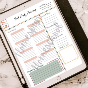 May include: A printable unit study planning template on a digital tablet. The template has sections for unit topic, sub topics, project ideas, media resources, field trip ideas, learning objectives, and stuff to get.