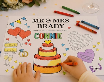 May include: A white coloring page with a wedding theme. It features a cake, hearts, a maze, and the text "MR & MRS BRADY THANK YOU FOR CELEBRATING OUR DAY WITH US CONNIE". The page is designed for coloring with crayons or markers.