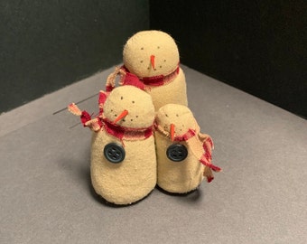 Primitive vintage handmade snowman trio with red scarfs, buttons and carrot noses. Cute holiday decor!