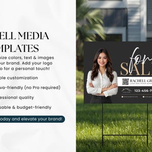 May include: A black and white real estate sign with the words "For Sale" in elegant script. The sign features a photo of a woman and contact information for Rachell Green, a local real estate agent. The sign is displayed on a metal stand in a grassy yard.