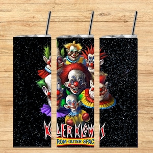 May include: A black and white tumbler with a graphic of a group of clowns with the text "Killer Klowns from Outer Space".