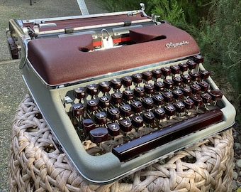 Máquina de escribir manual portátil Olympia SM3 vintage con estuche original y copia del manual de usuario