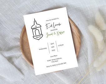 May include: A white invitation card with black text and a black and white illustration of a lantern. The text reads "You Are Invited To Eid Lunch Hosted By Javed & Nafisa April 10th 2024 5.30 pm xxxx Place 12345 Street Address, City,State Rsvp To XXXX At 123.456.7891"