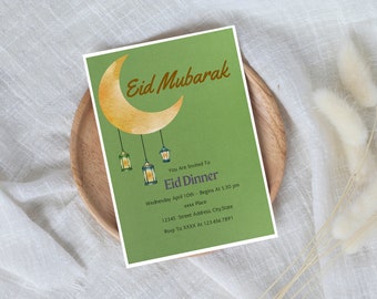 May include: Green invitation card with a gold crescent moon and hanging lanterns. The text reads "Eid Mubarak", "You Are Invited To", "Eid Dinner", "Wednesday April 10th - Begins At 5:30 pm", "xxxx Place", "12345 Street Address, City State", "Rsvp To XXXX At 123.456.7891".