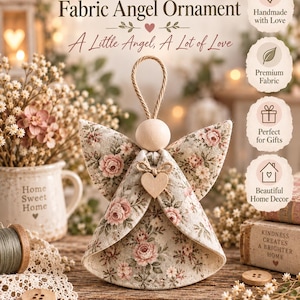 May include: A handmade fabric angel ornament featuring a floral pattern with pink roses and green leaves. The angel has a plain wooden bead head, a small wooden heart accent, and a jute twine loop for hanging. Text reads: Handmade Fabric Angel Ornament.