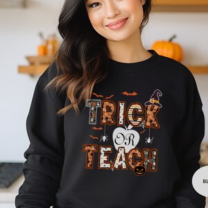 trick or teach halloween sweatshirt,gifts for teachers,gifts for teacher shirt,teacher gifts,trendy shirt,new teacjer,grandma,teacher