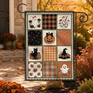 May include: A rectangular garden flag featuring a twelve-panel grid design with Halloween motifs including a ghost with a bow, a black cat, a jack-o'-lantern, a witch hat, autumn leaves, plaid patterns, and floral illustrations in orange, black, and cream.