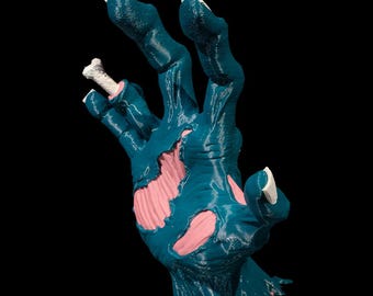 Uchwyt na słuchawki Hand from Beyond – uchwyt ścienny w kształcie upiornej dłoni