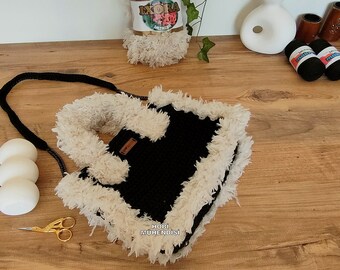 Magic Touch: Express Your Style with Black Plush Hand-Knit Bag!