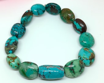 Natural Tibet Turquoise Oval Drum Stretch Bracelet: AAA+ Gemstone Beads (7-8 Inch)