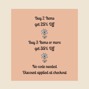 May include: A peach-colored background with white text and black flower illustrations. The text reads "Buy 2 Items get 25% Off", "Buy 3 Items or more get 35% Off", "No code needed", and "Discount applied at checkout".