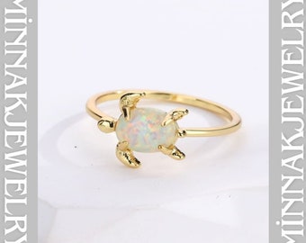 A Piece Of Rose Gold Plated Opal Turtle Ring