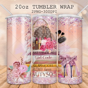 May include: A pink and white glitter tumbler wrap design with a pink and brown floral design, a brown handbag, makeup brushes, and a stack of books with the text "Make Up Book", "Girl Code", "Glammodel", "Glowy Faces", and "Beauty 50" on the front. The design also includes a pair of pink high heels with a bow on the back.