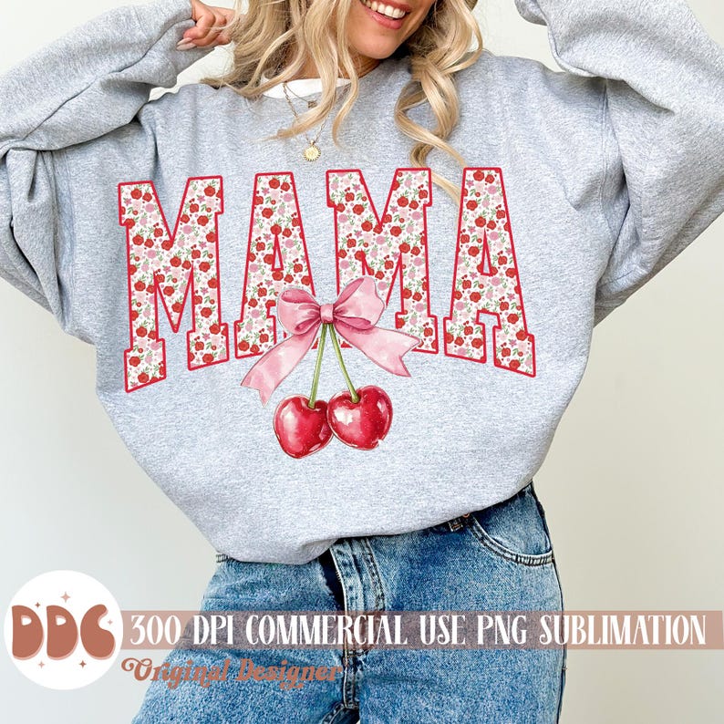May include: A gray sweatshirt with the word "MAMA" in red letters filled with a floral pattern. A pink bow and two red cherries are below the word. The text "300 DPI COMMERCIAL USE PNG SUBLIMATION" is at the bottom.