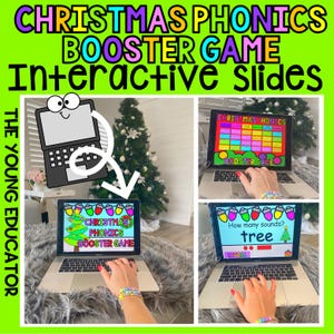 Puede incluir: Un fondo verde con el texto "CHRISTMAS PHONICS BOOSTER GAME Interactive Slides". La imagen muestra una computadora portátil que muestra un juego educativo con temática navideña. La computadora portátil está sobre una alfombra gris, con un árbol de Navidad al fondo.