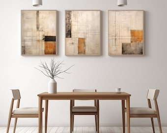 May include: Three abstract geometric paintings in brown, beige, and orange tones hang above a wooden dining table with four chairs. The paintings are framed in a light wood frame.
