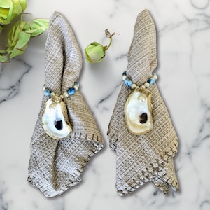 Coastal Elegance: Blue and White Beaded Oyster Shell Napkin Ring Holders
