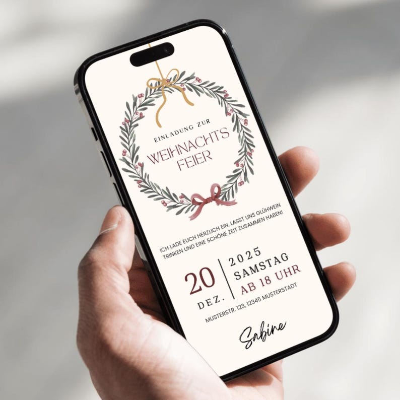 May include: A smartphone displays a Christmas party invitation. The design features a wreath, bow, and text in German. The invitation is for December 20, 2025, at 6 PM. The name "Sabine" is at the bottom.