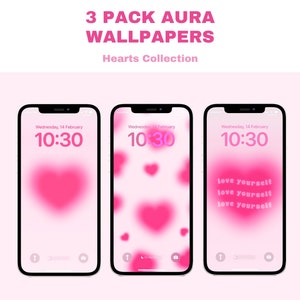 May include: Three phone screen wallpapers with a pink and white color scheme. The first wallpaper features a large pink heart in the center. The second wallpaper features a pink background with several smaller pink hearts. The third wallpaper features a pink background with the text "love yourself" repeated three times.